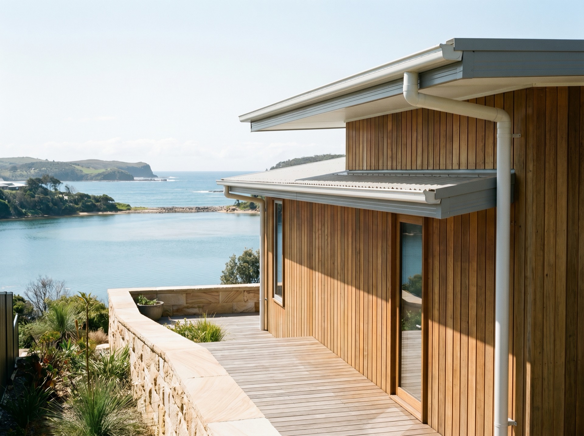 Gutter and downpipe replacement on a coastal home in Narooma